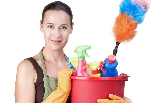 Cleaning professional using safety measures in Waterloo