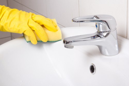 Trained cleaner applying safe cleaning practices in Waterloo