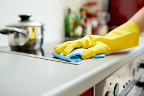 Professional office cleaners in Waterloo working in a business premises corridor